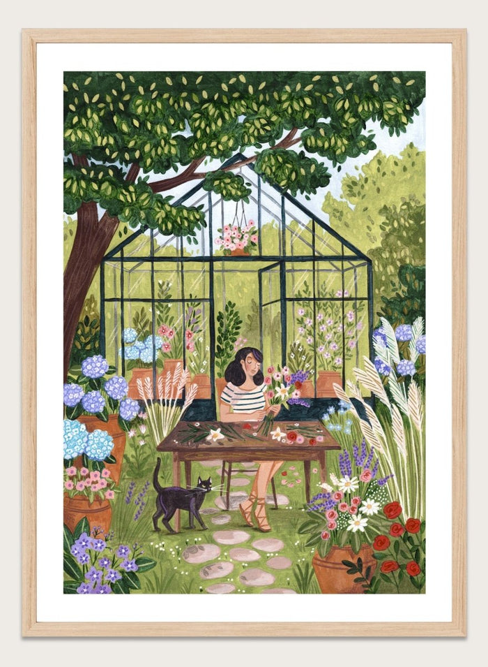 Garden Flower Arranging by Caroline Bonne Müller is a floral garden art print featuring greenhouse, woman arranging flowers, cat illustration, and modern aesthetic botanical scene.