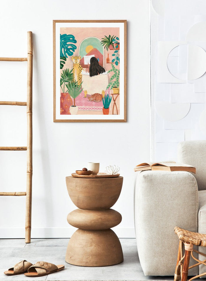 Illustration of a woman reading a book with a leopard and cat in a room filled with plants. Girl Reading Tropical Bath by Caroline Bonne Müller fine art print, wall art poster with bold color, tropical interior, modern playful aesthetic design.