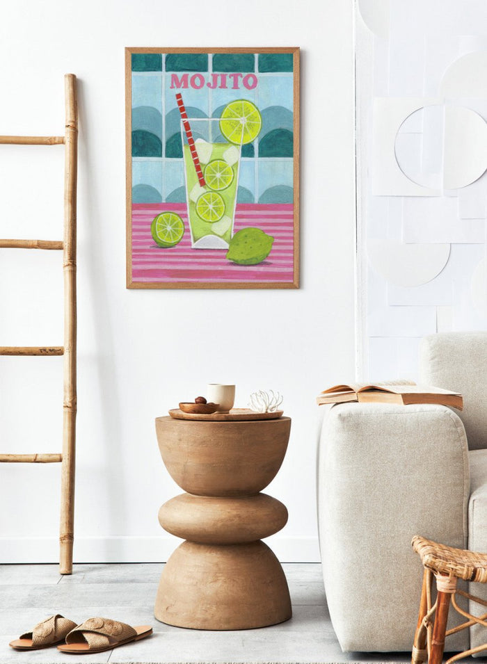 Illustration of a mojito cocktail with lime slices and a red straw on a tiled background. Glass of Mojito by Caroline Bonne Müller is a fine art print and wall poster featuring a lime mojito, citrus slices, and bold tiled background.
