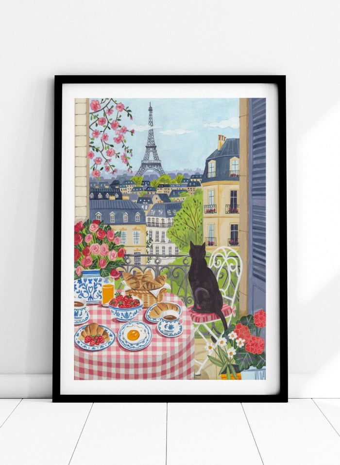 Parisian scene with a cat, table setting, and Eiffel Tower view. Paris Balcony Breakfast by Caroline Bonne Müller is a colorful Paris art print featuring Eiffel Tower view, breakfast table, cat illustration, and modern aesthetic city scene.