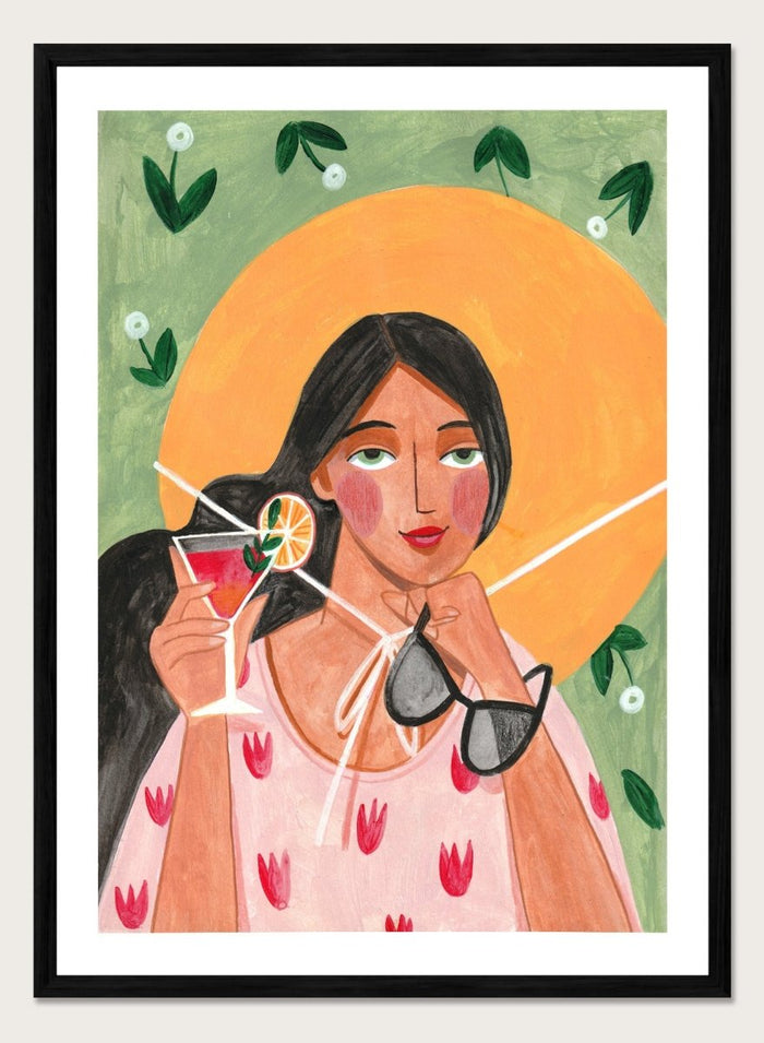 Illustration of a woman holding a cocktail and sunglasses with a sun and foliage background. Summer Woman Cocktail Hat by Caroline Bonne Müller is a fine art print and wall poster featuring a woman holding a cocktail with a bold yellow hat and bright summer colors.