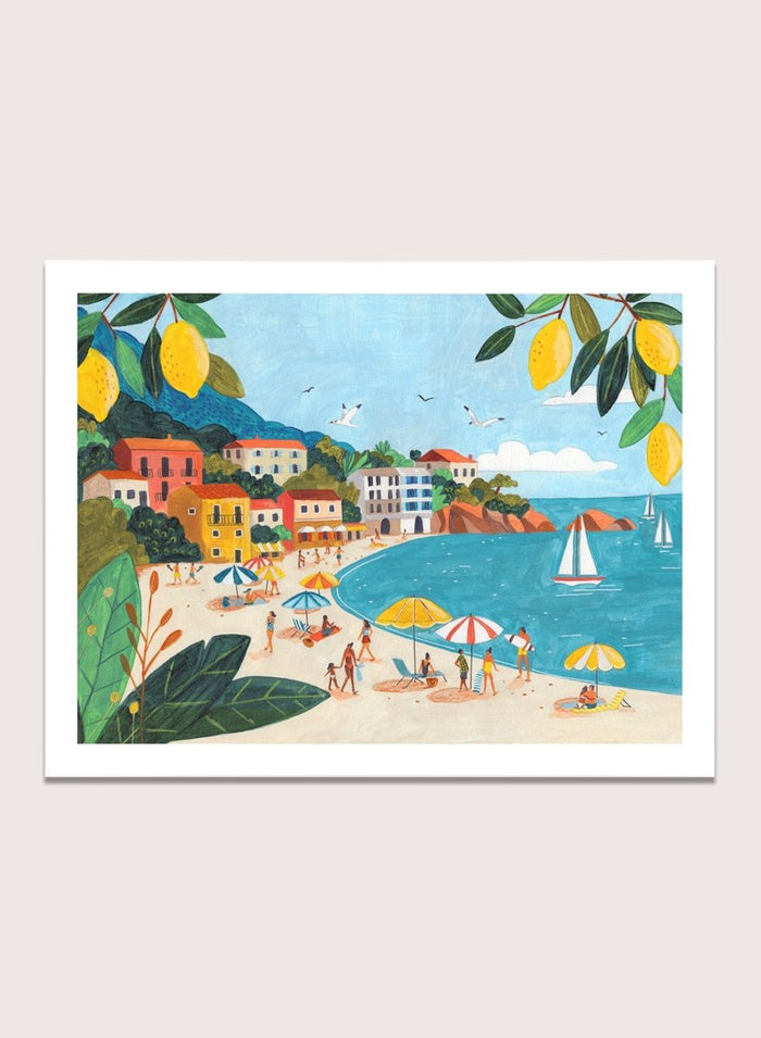 Framed artwork of a beach scene with people, umbrellas, and sailboats. Sunny Lemon Coastal Town by Caroline Bonne Müller is a colorful coastal art print featuring beach scene, seaside town, lemon branches, and modern aesthetic summer illustration.