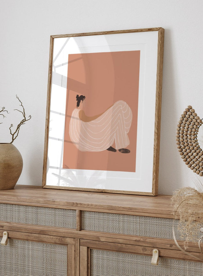 Warm minimalist woman art print by Casa Cartissi featuring soft peach tones and relaxed figure illustration. Contemporary modern wall poster with calm, sunlit aesthetic.