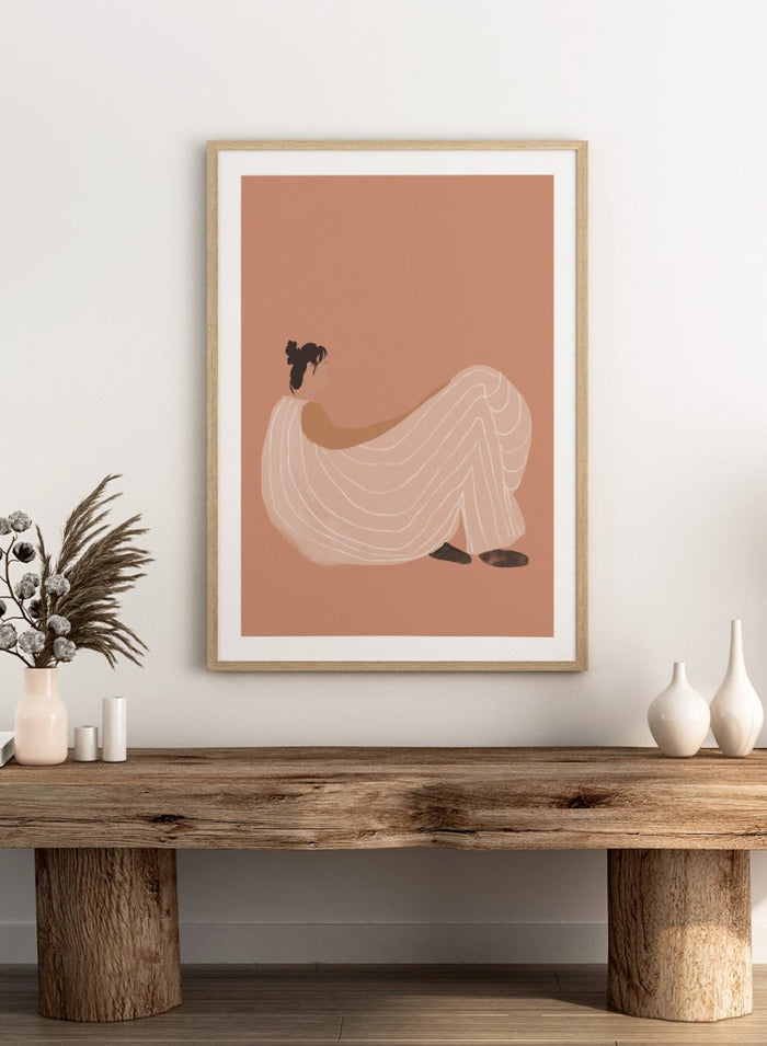 Warm minimalist woman art print by Casa Cartissi featuring soft peach tones and relaxed figure illustration. Contemporary modern wall poster with calm, sunlit aesthetic.