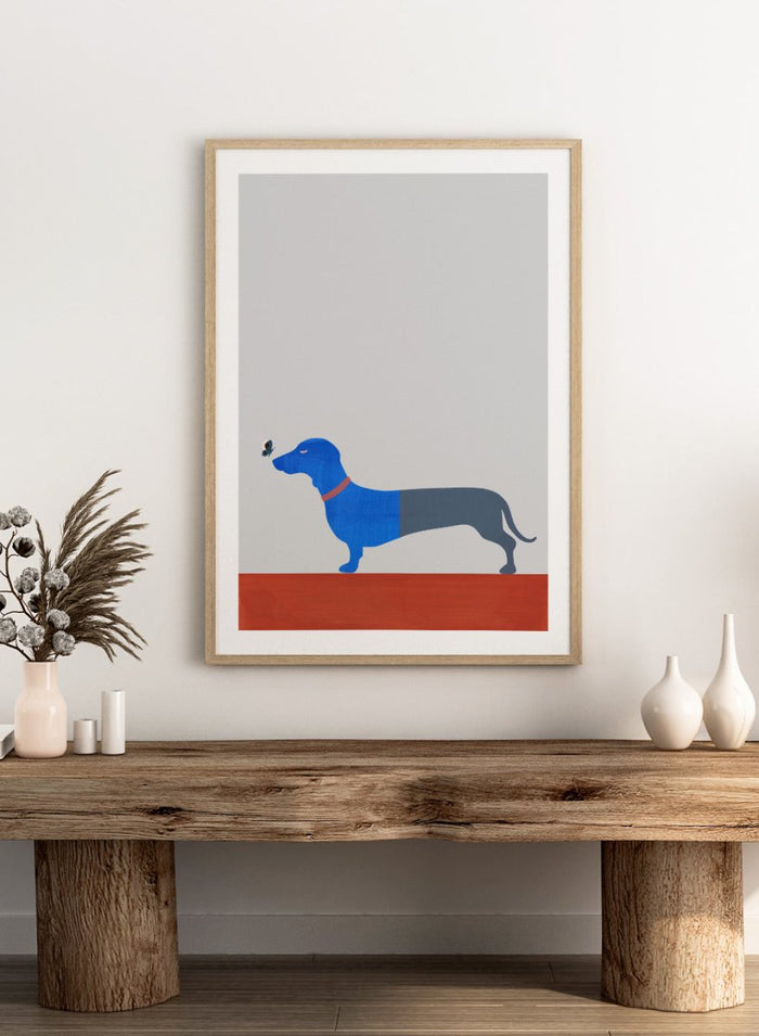 Blue dachshund wall art print by Casa Cartissi featuring a modern butterfly illustration. Contemporary minimalist animal fine art poster with textured shapes and warm color palette.