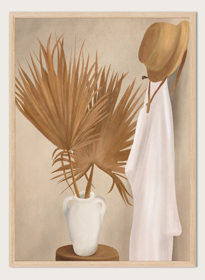 White vase with dried palm leaves and a white garment on a beige background. Boho Palm Summer Vibes by City Art is a neutral boho art print with dried palm leaves, a white summer dress, a straw hat, and warm organic textures.