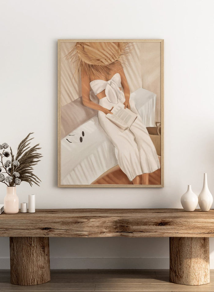 Woman in a white dress holding a clutch, sitting on a couch with a neutral background. Chic Summer Reading by City Art features a woman reading in a sunlit bedroom, bringing warm neutrals, relaxed interiors, and organic summer style home.