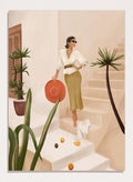 Woman descending stairs holding a red bag, surrounded by plants and fruit on a light background. Chic Woman Warm Steps by City Art features a woman surrounded by tropical plants and warm Mediterranean interiors, bringing organic living and natural style into the home.