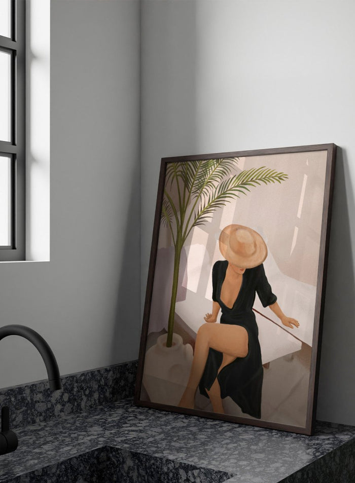 Woman in a black dress and straw hat sitting on a white chair with a plant nearby. Elegant Woman Sun Hat by City Art is a modern figurative art print featuring a stylish woman, tropical greenery, warm neutrals, and relaxed summer living.