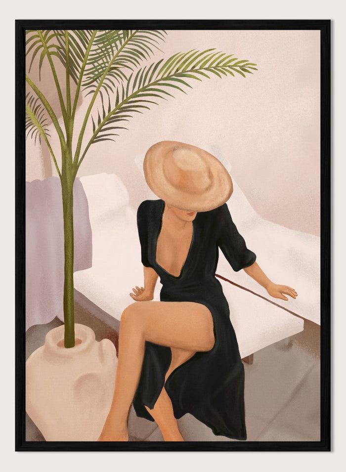 Woman in a black dress and straw hat sitting on a white chair with a plant nearby. Elegant Woman Sun Hat by City Art is a modern figurative art print featuring a stylish woman, tropical greenery, warm neutrals, and relaxed summer living.