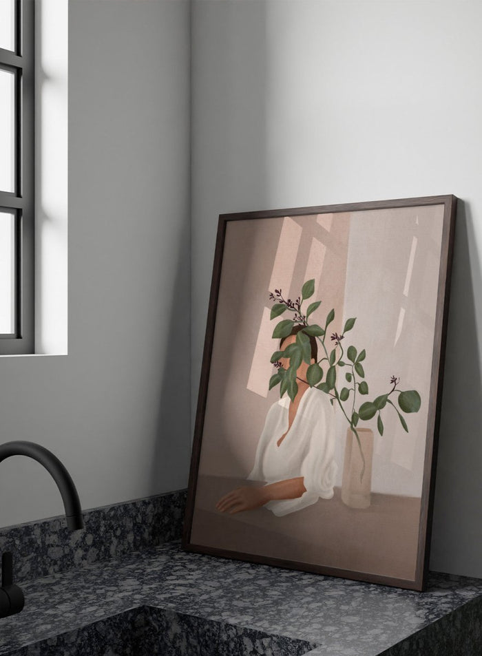 Artistic depiction of a woman with green leaves covering her face, sitting next to a vase on a table. Serene Botanical Woman by City Art features a woman surrounded by greenery, bringing soft botanical style and modern neutral wall art to your home.