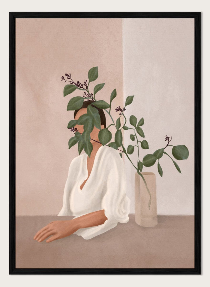 Artistic depiction of a woman with green leaves covering her face, sitting next to a vase on a table. Serene Botanical Woman by City Art features a woman surrounded by greenery, bringing soft botanical style and modern neutral wall art to your home.