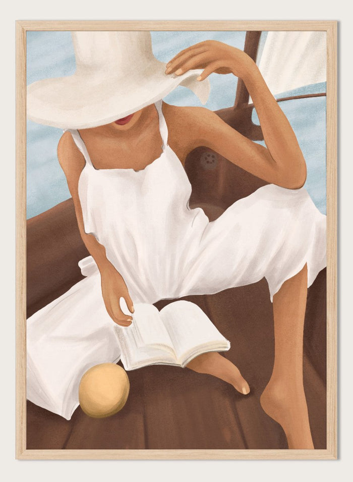 Woman in a white dress and hat reading a book on a boat. Summer Boat Reading by City Art is a modern coastal art print featuring a woman reading on a boat in a white dress, surrounded by blue water and warm wood.