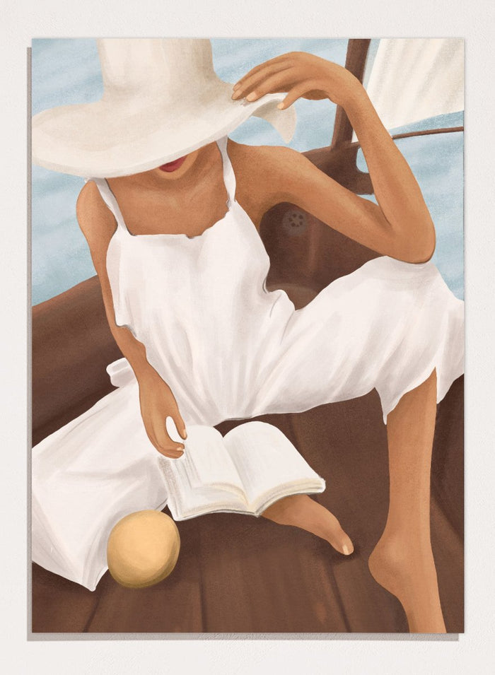 Woman in a white dress and hat reading a book on a boat. Summer Boat Reading by City Art is a modern coastal art print featuring a woman reading on a boat in a white dress, surrounded by blue water and warm wood.