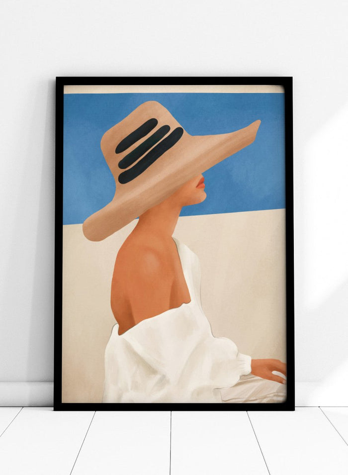 Woman wearing a large straw hat with black bands against a blue sky. Summer Hat Profile by City Art features a woman beneath a straw sun hat against a blue sky, bringing coastal style and summer-inspired portrait art into the home.