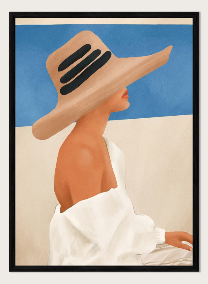 Woman wearing a large straw hat with black bands against a blue sky. Summer Hat Profile by City Art features a woman beneath a straw sun hat against a blue sky, bringing coastal style and summer-inspired portrait art into the home.