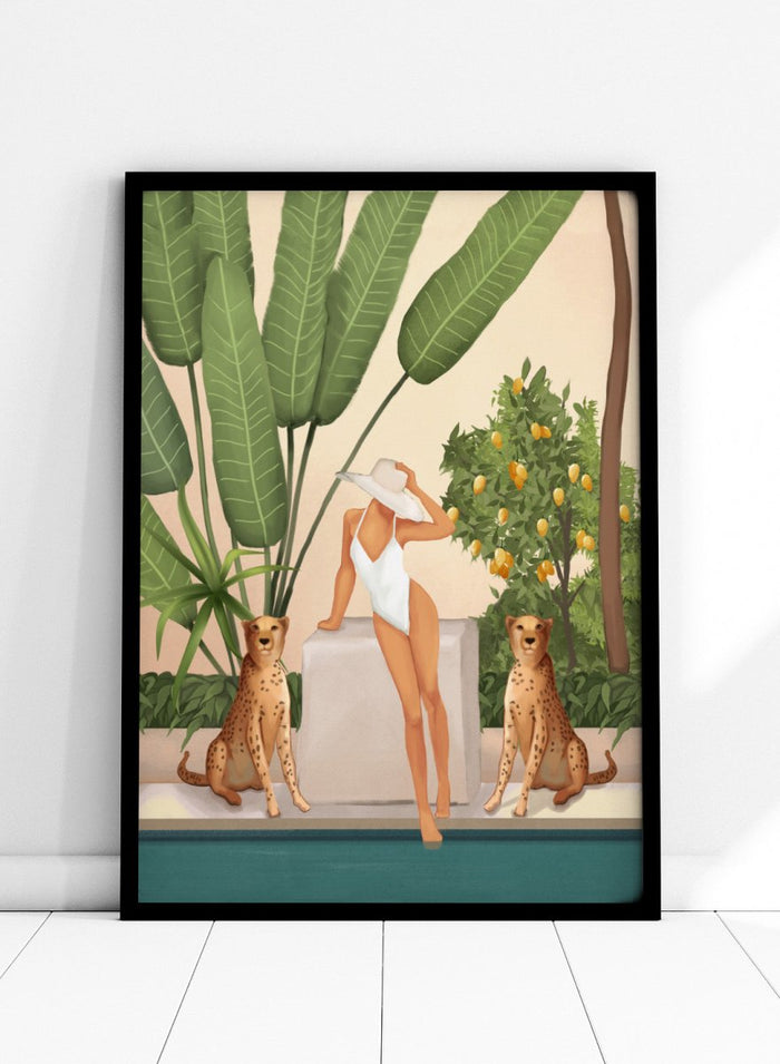 Woman in a white swimsuit standing with leopards in a tropical setting. Tropical Woman and Cheetahs by City Art is a playful tropical art print featuring a woman by the pool, cheetahs, citrus trees, and lush greenery.