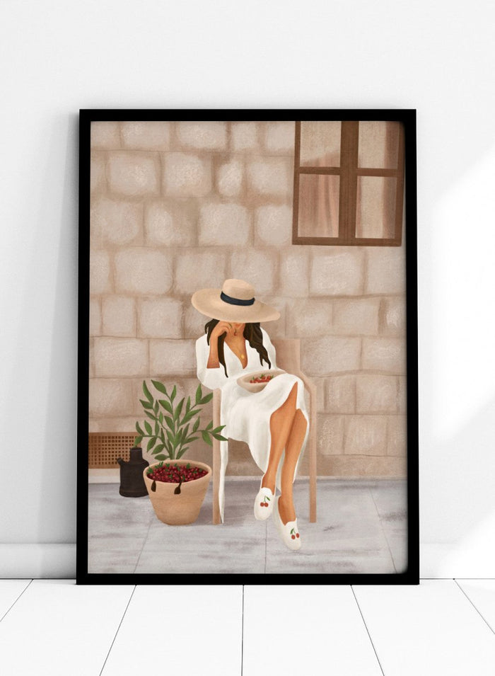 Illustration of a woman sitting on a chair with a plant and bowl of fruit in a stone-walled room. Woman with Cherries on Patio by City Art is a modern summer art print featuring a woman in white, fresh cherries, a sun hat, and warm patio style.