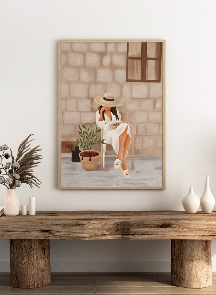 Illustration of a woman sitting on a chair with a plant and bowl of fruit in a stone-walled room. Woman with Cherries on Patio by City Art is a modern summer art print featuring a woman in white, fresh cherries, a sun hat, and warm patio style.