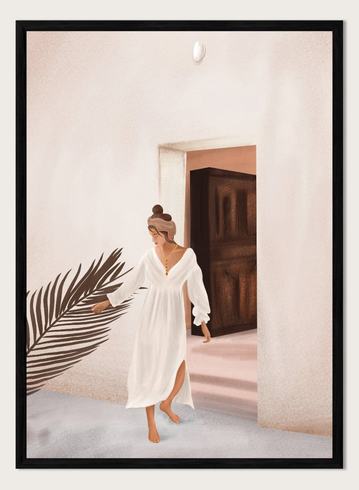 Woman in a white dress standing in a doorway with a palm leaf in the foreground. Woman With Palm Leaf by City Art is a modern figurative art print featuring a woman in a white dress, tropical greenery, warm neutrals, and Mediterranean style.