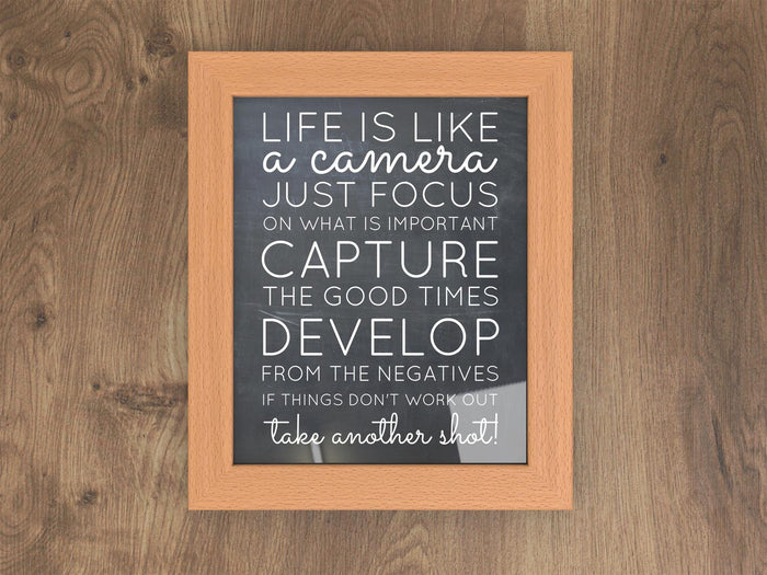 Beech picture frames displaying inspirational quote artwork in a wooden setting.