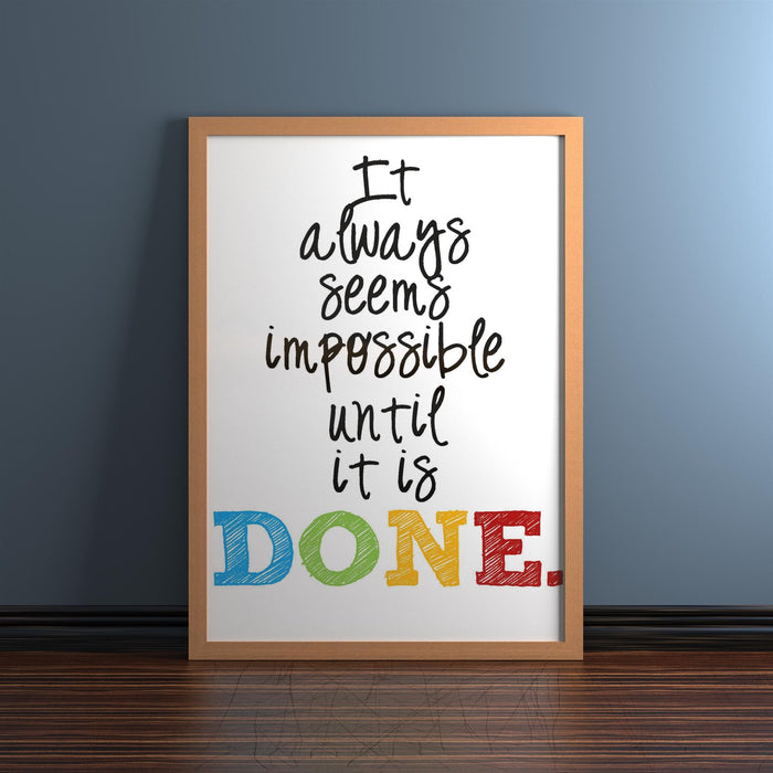 Beech picture frames featuring an inspiring quote: "It always seems impossible until it is DONE."