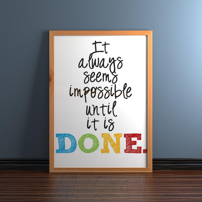 Classic pine picture frame showcasing an inspirational quote artwork with colorful lettering.