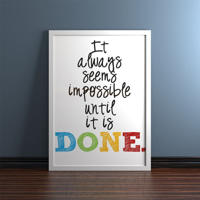 Inspirational quote poster framed in a white picture frame classic range on a wooden floor.