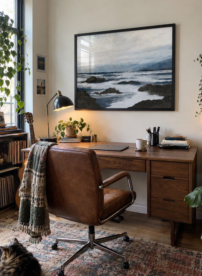 Shop Côte by Dan Hobday, a contemporary coastal wall art print featuring a moody ocean seascape, rocky shoreline, and layered blue-gray brushwork.