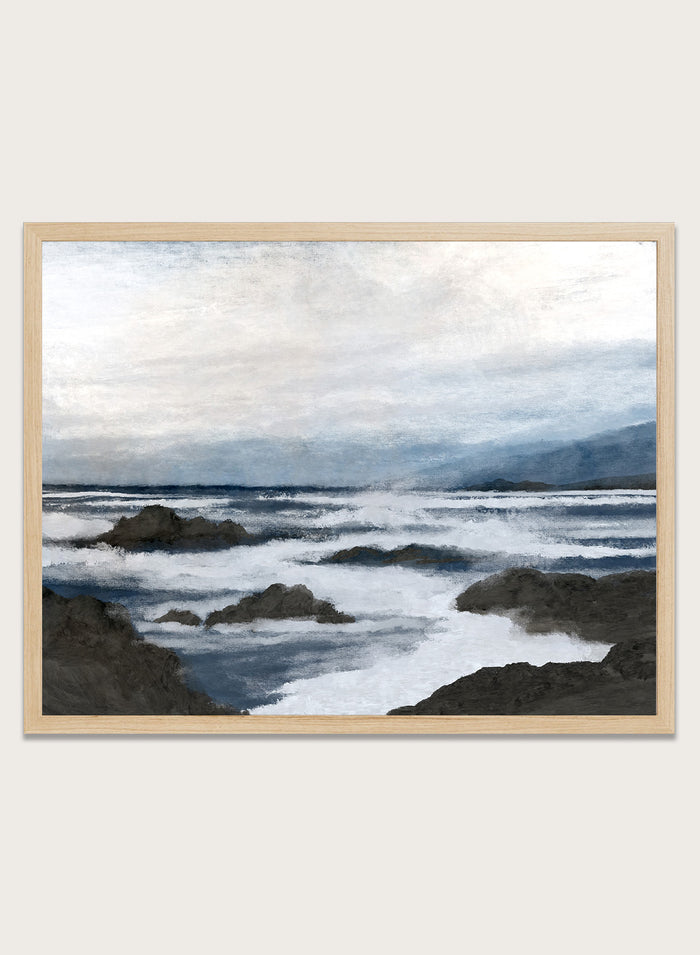 Shop Côte by Dan Hobday, a contemporary coastal wall art print featuring a moody ocean seascape, rocky shoreline, and layered blue-gray brushwork.