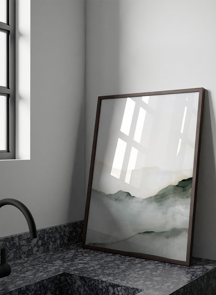 Minimalist watercolor landscape art print featuring soft gray and black inked mountain silhouettes against a clean white background. Shop Ridge by Dan Hobday, a contemporary mountain landscape wall art print featuring soft ridgelines, misty depth, muted green, gray, and cream tones.