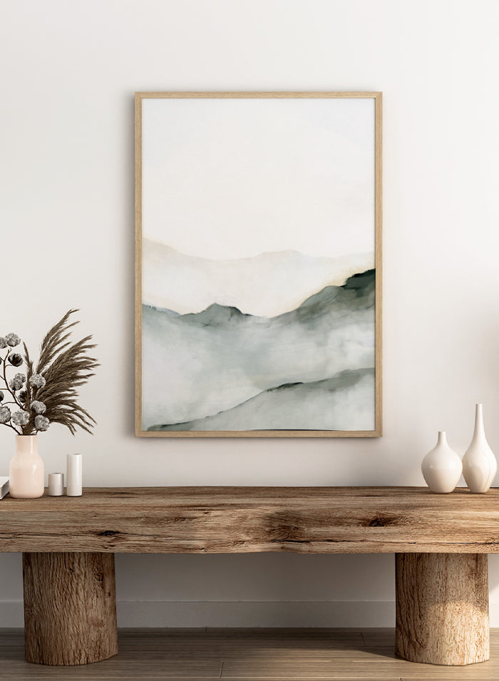 Minimalist watercolor landscape art print featuring soft gray and black inked mountain silhouettes against a clean white background. Shop Ridge by Dan Hobday, a contemporary mountain landscape wall art print featuring soft ridgelines, misty depth, muted green, gray, and cream tones.