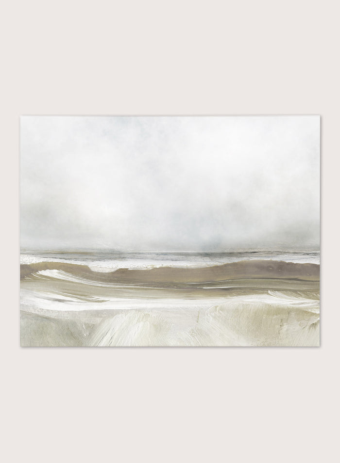 A framed abstract landscape art print depicting a misty beach scene with soft beige, gray, and white tones. Shop Sea Air by Dan Hobday, a contemporary coastal wall art print featuring ocean waves, a soft horizon, misty gray tones, and warm taupe brushwork.