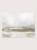 A framed abstract landscape art print depicting a misty beach scene with soft beige, gray, and white tones. Shop Sea Air by Dan Hobday, a contemporary coastal wall art print featuring ocean waves, a soft horizon, misty gray tones, and warm taupe brushwork.