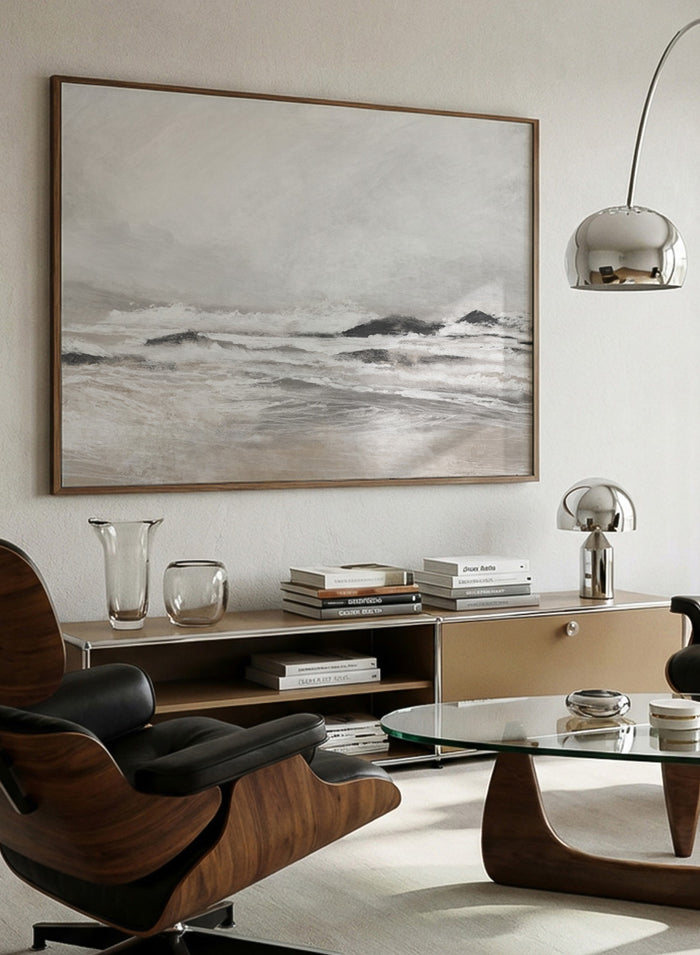 Shop September Coast by Dan Hobday, a contemporary coastal wall art print with ocean waves, rocky shoreline, soft gray-beige tones, and textured brushwork.
