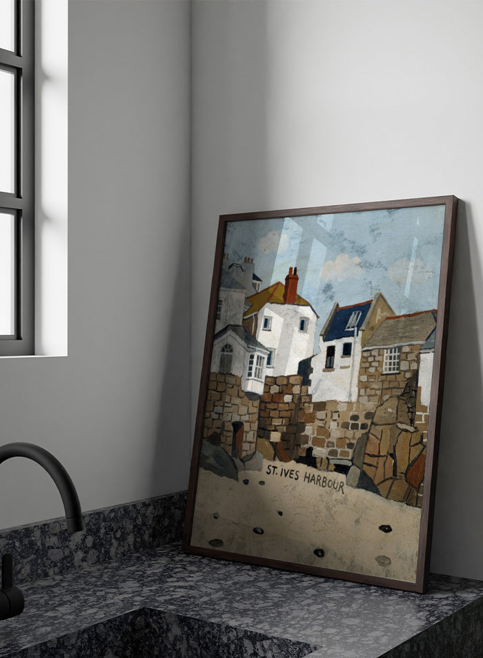 A painted coastal scene labeled 'ST. IVES HARBOUR' showing white and stone buildings, rocky walls, sandy foreground, and a pale blue sky. Shop St. Ives Harbour Beach by Dan Hobday, a coastal wall art print featuring whitewashed houses, stone walls, sandy beach, and soft blue and earthy tones.