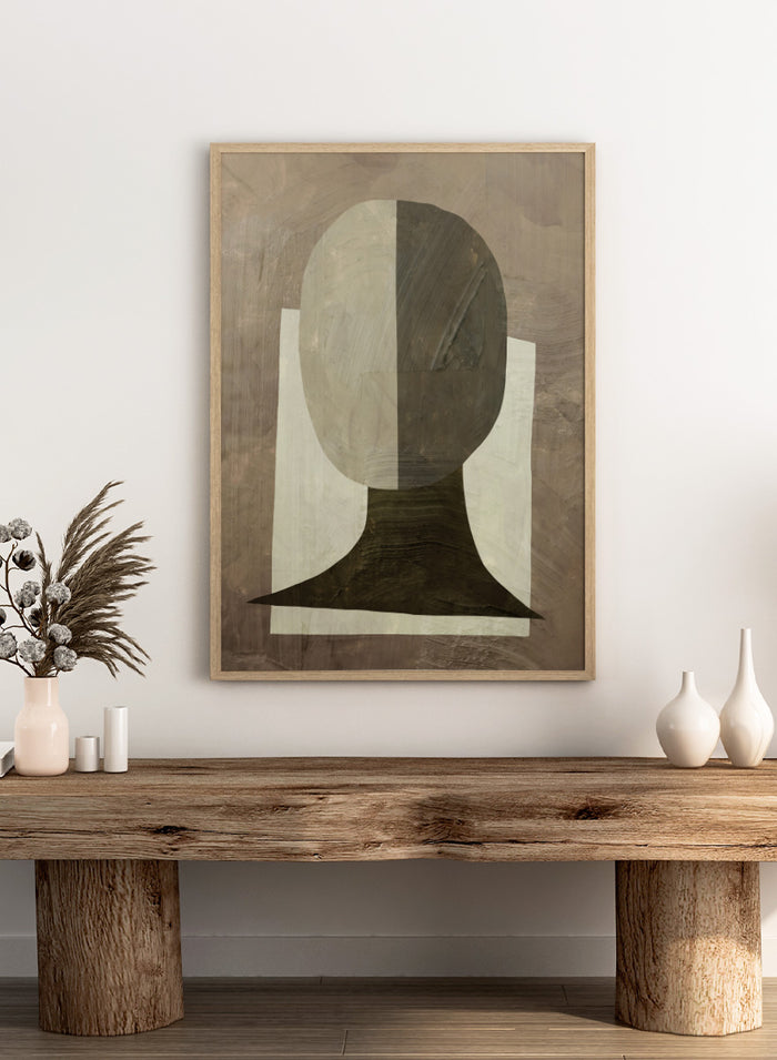 An abstract geometric art print featuring a stylized head and neck silhouette in shades of gray, brown, and off-white. Shop Study by Dan Hobday, a contemporary abstract portrait art print featuring a simplified human figure, geometric forms, and earthy brown and cream tones.