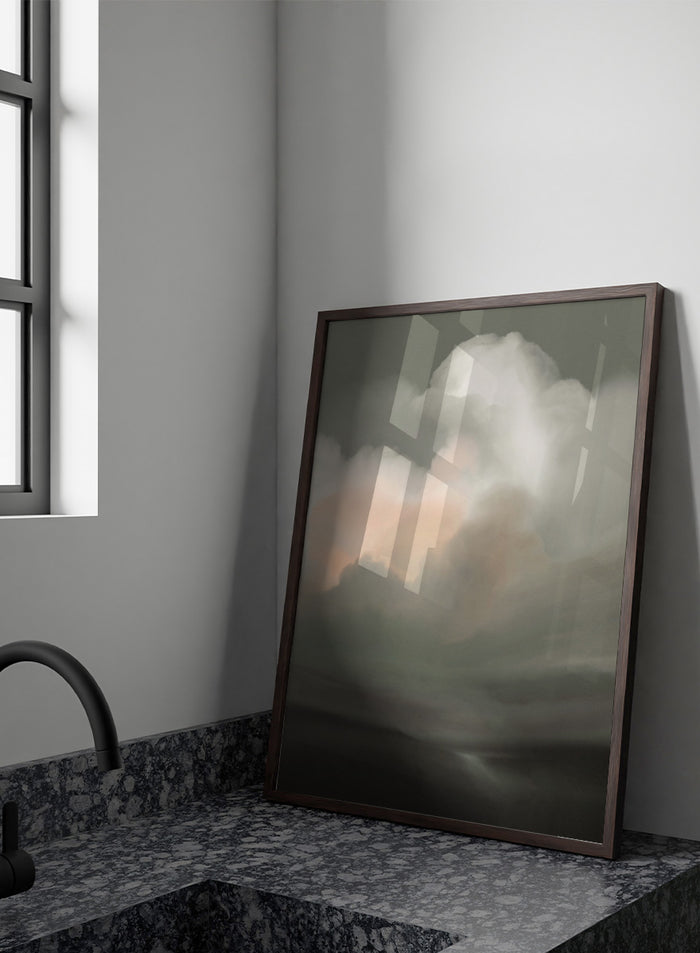 Shop Tempesta by Dan Hobday, a dramatic landscape wall art print featuring storm clouds, moody skies, soft gray-green tones, and a subtle peach glow.