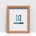 Beech picture and poster frames showcased with a minimalist logo design in a wooden frame.