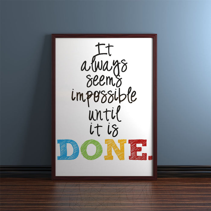 Mahogany picture and poster frame displaying the motivational quote 'It always seems impossible until it is DONE.'
