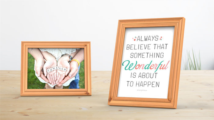 Devon Range pine poster frame displaying a heartfelt photograph and an inspiring quote on a wooden table.