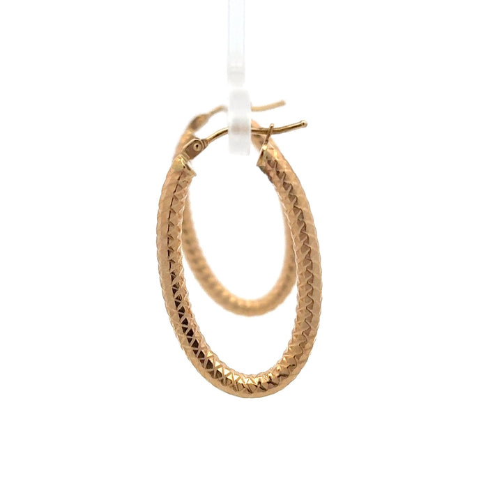 Diamond-Cut Oval Yellow Gold Hoop Earrings