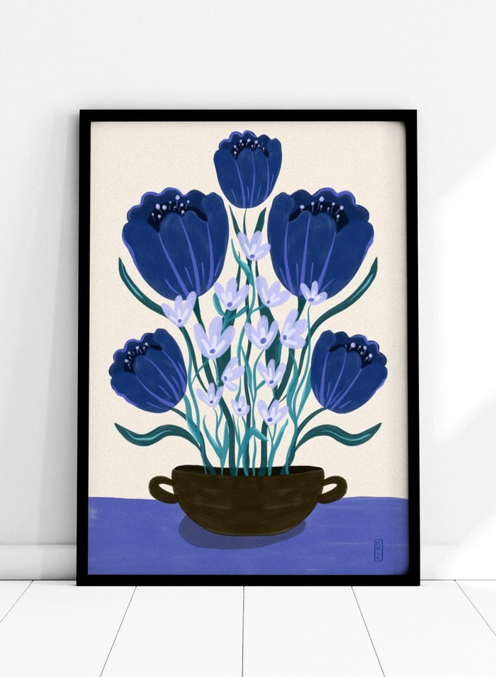 Artistic depiction of blue flowers in a black pot on a beige background. Blue Floral Arrangement by Dirkie Nell is a botanical floral art print featuring deep blue flowers, folk inspired illustration, modern wall art, and expressive hand painted details.