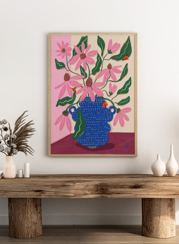 Artistic depiction of a blue vase with pink flowers on a pink background. Cone Flowers in a Pot by Dirkie Nell is a colorful floral art print with pink blooms, butterflies, and a bold blue vase. Officially licensed wall poster.