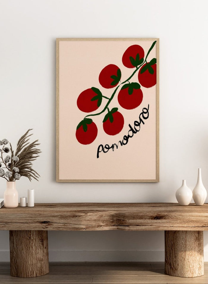 Illustration of red tomatoes on a branch with ' pomodoro' text on a beige background. Italian Pomodoro Tomatoes by Dirkie Nell is a contemporary food art print featuring hand painted red tomatoes, playful typography, and colorful Mediterranean inspired style.