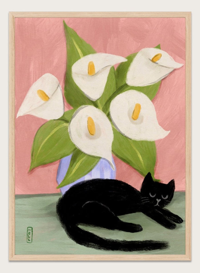 Black cat lying on a surface with white flowers in a blue vase against a pink background. Lilies In a Vase and a Black Cat by Dirkie Nell is a contemporary floral cat art print featuring hand painted lilies, soft pink tones, and playful still life illustration.