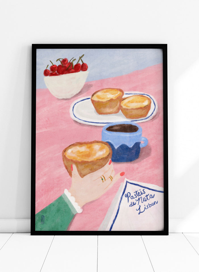 A stylized illustrated scene showing a hand holding a pastry, with two pastries on a plate, a cup of coffee, a bowl of cherries, and a napkin reading 'Pastéis de Nata Lisboa' on a pink tabletop. Shop Lisbon Custard Tarts by Dirkie Nell, a colorful food and travel art print featuring pastéis de nata, coffee, cherries, and a pink café table.