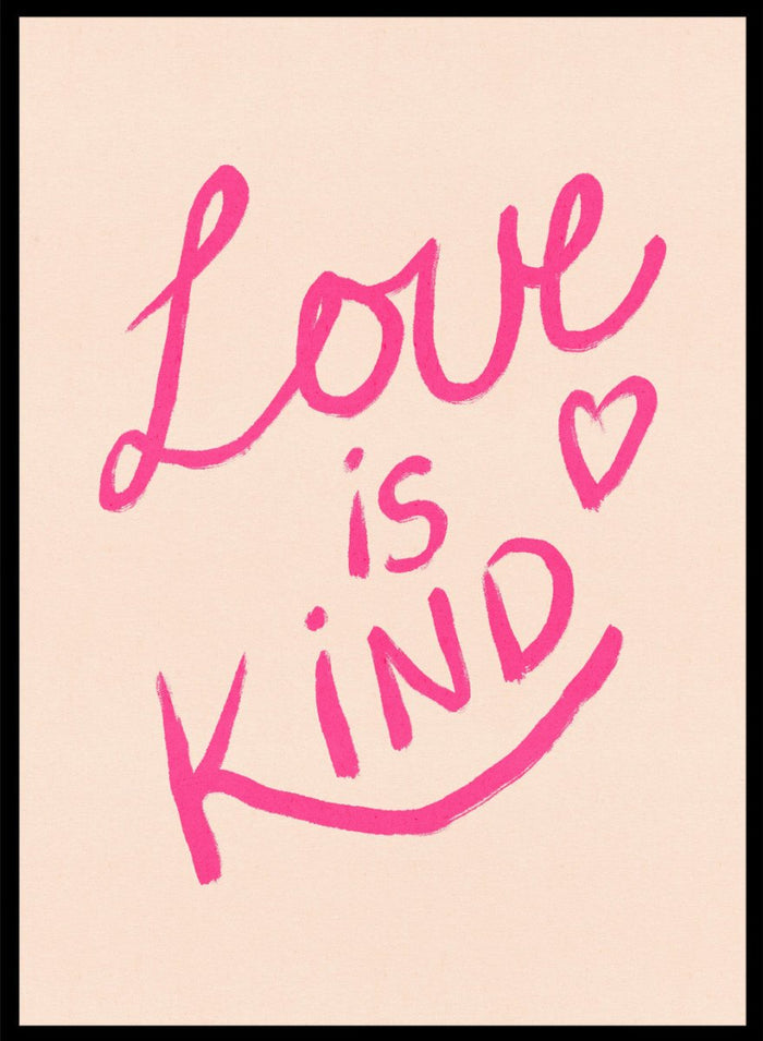 Pink text 'Love is Kind' with a heart on a light pink background. Love Is Kind by Dirkie Nell is a pink typography art print with handwritten lettering and heart detail. A joyful modern love wall poster.
