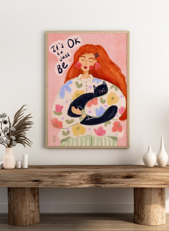 Peaceful Cat Cuddles by Dirkie Nell is a colorful cat art print featuring floral illustration, cozy pastel tones, whimsical wall art, and expressive hand painted details.