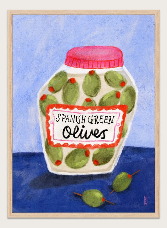 Illustration of a jar of Spanish green olives on a blue background. Spanish Green Olives Jar by Dirkie Nell is a playful food art print featuring hand painted olives, colorful kitchen details, and Mediterranean inspired design.